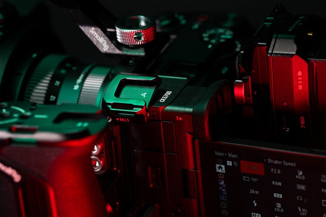 Close-up of a professional video camera recording in a studio