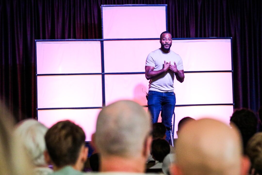 person speaking on stage