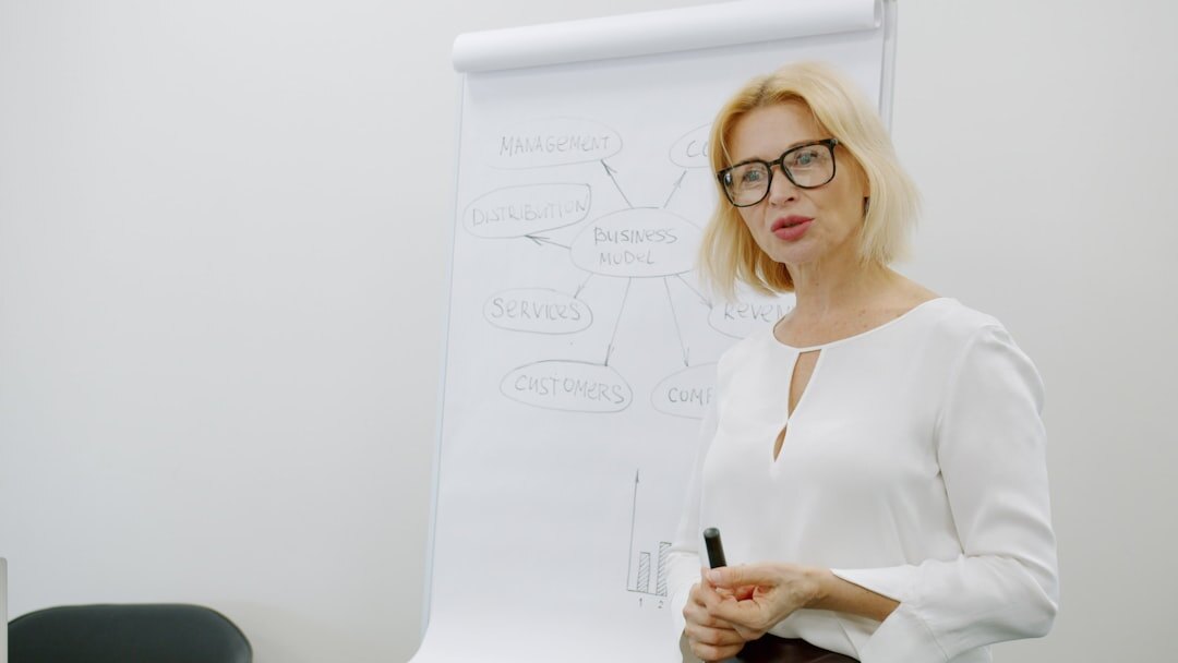 woman presenting at conference