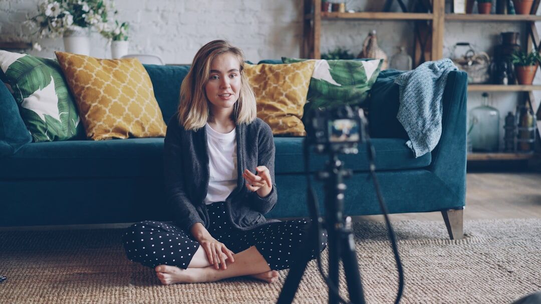 woman recording video at home